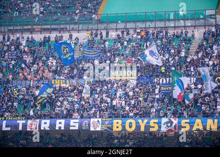 Milan, Italy - september 25 2021 - Serie A match F.C. Internazionale - Atalanta BC San Siro stadium - f.c. inter supporters waving their flags during the match Stock Photo