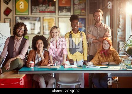 Group portrait of young employees team at the office Stock Photo