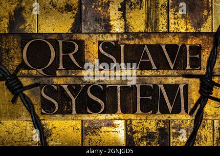 QR Slave System text on textured grunge copper and vintage gold background Stock Photo