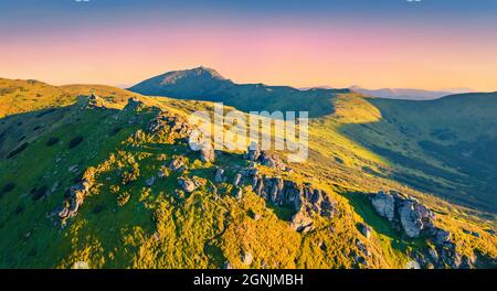 Colorful summer sunset on Carpathian mountains. Splendid evening view of popular tourist destination - Pip Ivan peak with old polish observatory on th Stock Photo