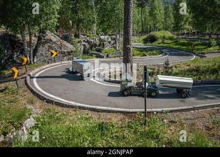 Lillehammer, Norway - June 07 2008: Childrens sized trucks on a paved track Stock Photo