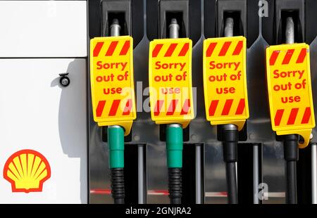 Loughborough, Leicestershire, UK. 26th Sep, 2021. Out of use signs hang from fuel pumps at a Shell petrol station after the government urged people to carry on buying petrol as normal, despite supply problems that have closed some stations. Credit: Darren Staples/Alamy Live News
