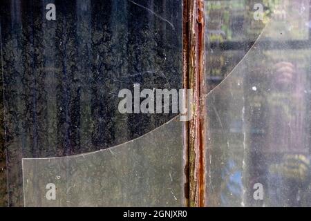 Broken Glass Window Close Up On A Garden Shed With No People Stock Photo
