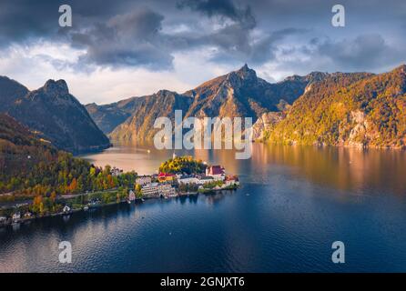Aerial landscape photography. Dramatic autumn view from flying drone of Traunsee lake. Wonderful landscape of Austrian Alps with Traunstein peak on ba Stock Photo