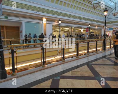 Madrid, Spain September 26, 2021, waiting in queues in Manzana shops to buy the latest model of the brand. Stock Photo