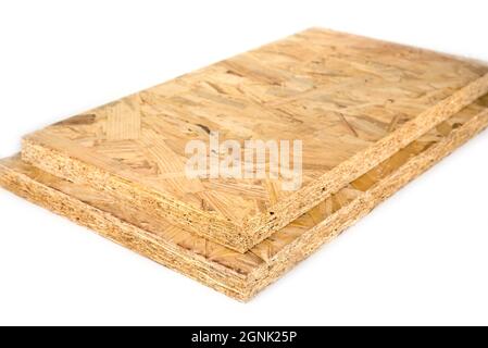 Oriented strand board on a white background.OSB construction material Stock Photo