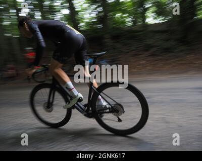 Hollingbourne, Kent, UK. 26th September, 2021. Photos from the annual 'Hollingbourne Hill Climb' cycling time trial organised by Wigmore Cycling Club. This is one of the shortest but most punishing time trials around. The course is the best part of a mile up the grueling Hollingbourne Hill which rises at a very steep gradient over the north downs in Kent, with the gradient increasing even further half way up!  41 competitors from around the South East took part in this end of season event. Credit: James Bell/Alamy Live News Stock Photo