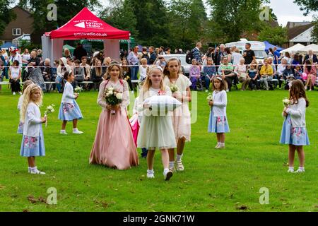 Lymm, Cheshire, UK. 25th Sept 2021. 25 September 2021 - Lymm Village in Cheshire held the annual Lymm May Queen Festival which was postponed earlier in the year due to the COVID-19 pandemic. Lymm Rose Queen was also crowned at this event Credit: John Hopkins/Alamy Live News Stock Photo