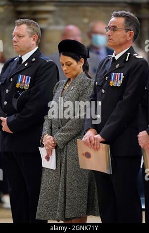 (left to right) John Apter, National Chair of the Police Federation of England and Wales, Home Secretary Priti Patel, and Lincolnshire Police Chief Constable Chris Haward, during the National Police Memorial Day Service at Lincoln Cathedral, Lincoln. Picture date: Sunday September 26, 2021. Stock Photo