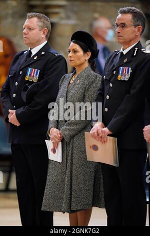 (left to right) John Apter, National Chair of the Police Federation of England and Wales, Home Secretary Priti Patel, and Lincolnshire Police Chief Constable Chris Haward, during the National Police Memorial Day Service at Lincoln Cathedral, Lincoln. Picture date: Sunday September 26, 2021. Stock Photo