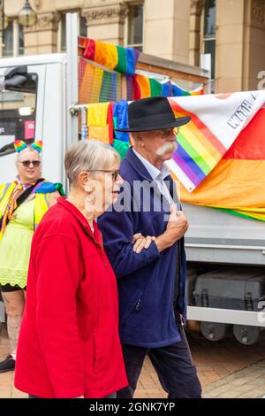 older distinguished couple walk arm in arm at Birmingham Pride Saturday 25th September 2021 Stock Photo