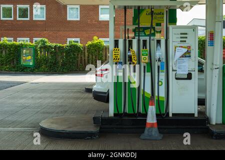 Northampton UK - Sep 26 2021: out of use signs on fuel pumps at BP petrol station Petrol and diesel fuel shortages. Stock Photo