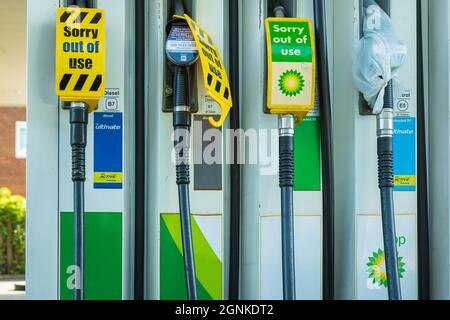 Northampton UK - Sep 26 2021: out of use signs on fuel pumps at BP petrol station Petrol and diesel fuel shortages. Stock Photo