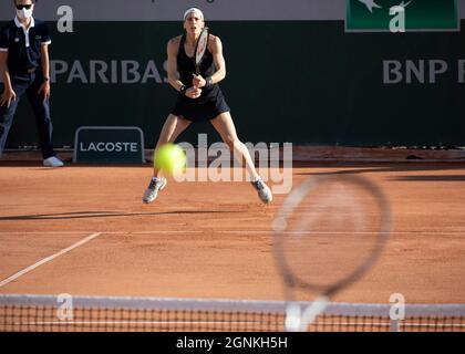 German tennis player Andrea Petkovic (GER) awaiting service, French Open 2021 tennis tournament, Paris, France. Stock Photo