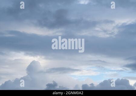 Dramatic cloudy sky with grey and white clouds over Wales Stock Photo