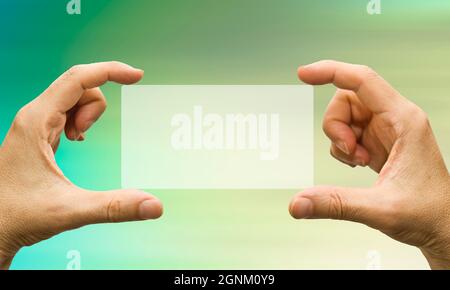 hands holding a blank tag Stock Photo