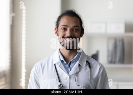Happy young African American doctor, physician, therapist Stock Photo