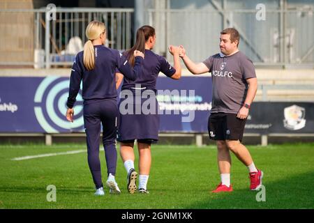 Dartford, UK. 26th Sep, 2021. Managers bump fists after the game during the FA Women's Championship game between London City Lionesses and Coventry United at Princes Park in Dartford Credit: SPP Sport Press Photo. /Alamy Live News Stock Photo