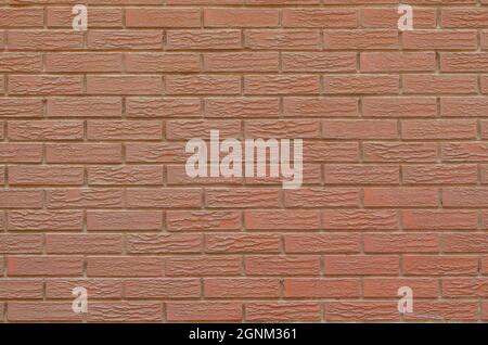 orange dirty brick wall with textures. classic brick wall for copy space. material for graphic design. Stock Photo
