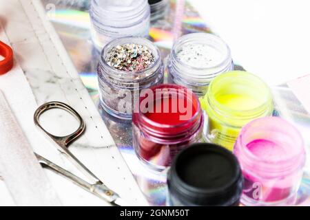Set of professional manicure tools on table. Stock Photo