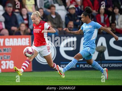 Arsenal's Beth Mead (left) and Manchester City's Demi Stokes battle for the ball during the FA Women's Super League match at The Hive, London. Picture date: Sunday September 26, 2021. Stock Photo