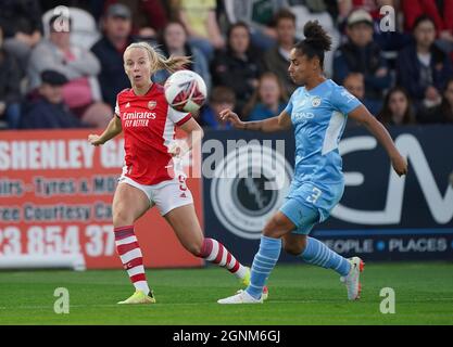 Arsenal's Beth Mead (left) and Manchester City's Demi Stokes battle for the ball during the FA Women's Super League match at The Hive, London. Picture date: Sunday September 26, 2021. Stock Photo