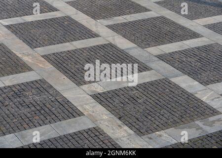 Facing gray tiles as a vintage background Stock Photo