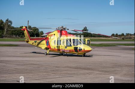 Gothenburg, Sweden - August 30 2008: Sikorsky S-76A SE-JUC Ambulance helicopter on pad at Säve Airport. Stock Photo