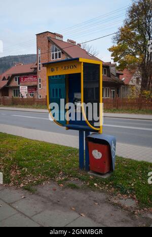 Wisla, Poland - november 08 2008: Classic streetside telephone booth in Wizła. Stock Photo