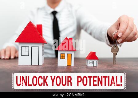 Conceptual display Unlock Your Potential. Word for release possibilities Education and good training is key Different plans for houses represented by Stock Photo