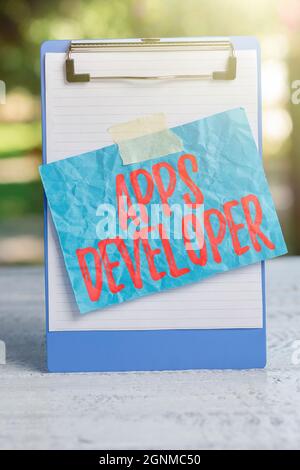 Handwriting text Apps Developer. Word for Graphic artist Software Programmer and Analyst Experts Outdoor Coffee And Refresment Shop Ideas, Cafe Stock Photo