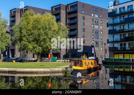 The Cotton Field Wharf apartment blocks, from the Cotton Field Park marina, New Islington, Ancoats, Manchester, England, UK Stock Photo