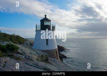 Castle Hill lighthouse in Newport, Rhode Island, overlooking Narragansett Bay from a rocky shoreline -04 Stock Photo
