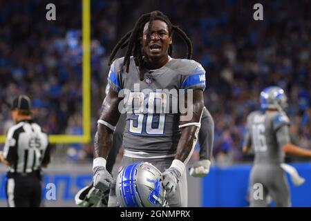 Detroit Lions running back Jamaal Williams (30) jokes with fans as he warms  up prior to an NFL football game against the Green Bay Packers, Monday,  Sept. 20, 2021, in Green Bay