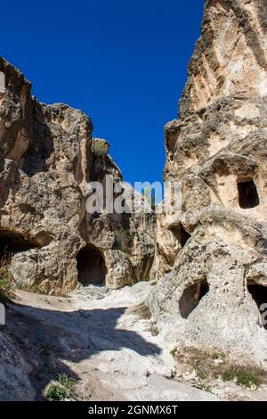 Phrygian Valley (Frig Vadisi). Ruins from thousands of years ago. Ancient caves and stone houses in Ayazini Afyonkarahisar, Turkey. Stock Photo
