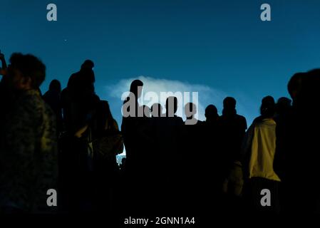 Spain. 26th Sep, 2021. People watch the fireworks show marking the end of the catalan Mercè festival from the Turò de la Rovira hill, also know as Bunkers del Carmel, in Barcelona, Spain on September 26, 2021. Credit: Sipa USA/Alamy Live News Stock Photo