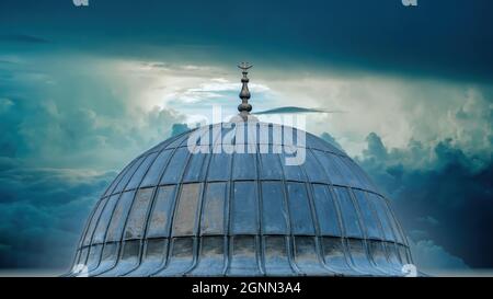 Istanbul, Turkey - September 2021: Dome of Suleymaniye Mosque with dramatic sunset, Eminonu, Istanbul, Turkey Stock Photo