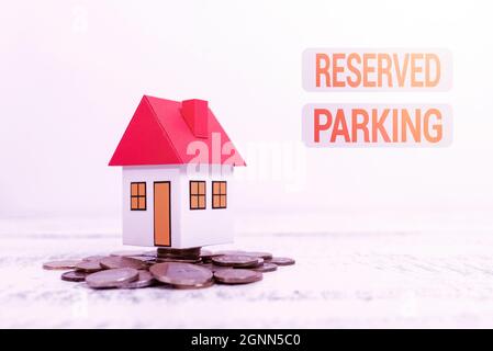 Writing displaying text Reserved Parking. Business approach parking spaces that are reserved for specific individuals Allocating Savings To Buy New Stock Photo