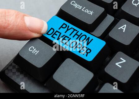 Text sign showing Python Developer. Business approach responsible for writing serverside web application logic Compiling And Typing Online Research Stock Photo