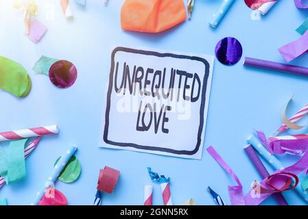 Hand writing sign Unrequited Love. Conceptual photo not openly reciprocated or understood as such by beloved Colorful Party Collections Flashy Stock Photo