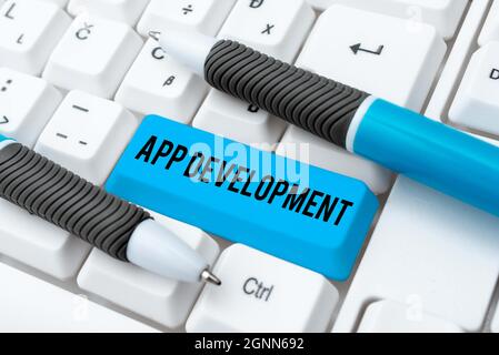 Writing displaying text App Development. Concept meaning Development services for awesome mobile and web experiences Typing Helpful Blog Tutorial And Stock Photo