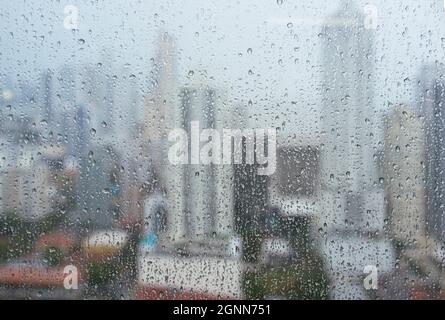 background of raindrops on the window, rainy weather Stock Photo