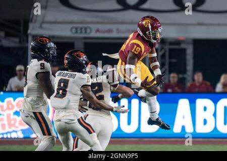 Oregon State Beavers linebacker Jack Colletto (12) hits Southern California Trojans safety Jaylin Smith (19) before he can recover the onside kick dur Stock Photo