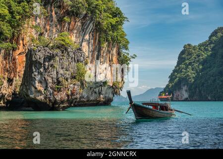 Tropical islands view with long tail boat and ocean blue sea water at Koh Lao Lading, Krabi Thailand nature landscape
