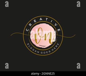 VN Feminine logo beauty monogram and elegant logo design, handwriting logo of initial signature, wedding, fashion, floral and botanical with creative Stock Vector