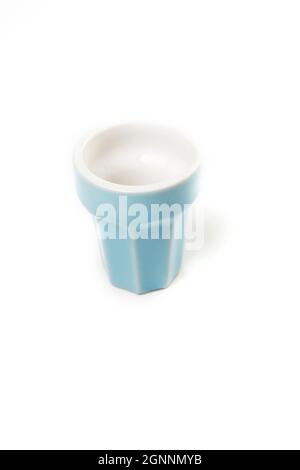 Blue glass cup isolated on white background Stock Photo