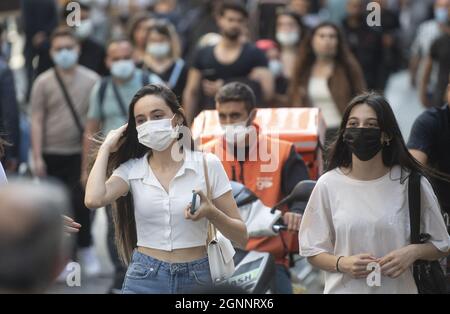 People wearing face masks walk on a street in Istanbul, Turkey, on September 25, 2021. Turkey has confirmed 26,145 new positive cases of the coronavirus infection in the country. Photo by Abdurrahman Antakyali /Depo Photos/ABACAPRESS.COM Stock Photo