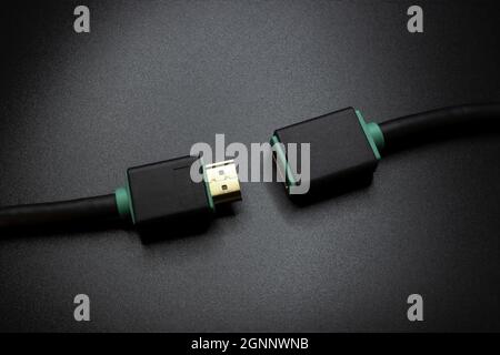 HDMI cable isolated on black background Stock Photo