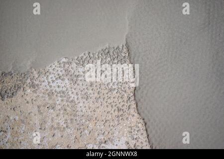 floor partially covering with self-levelling cement mortar Stock Photo