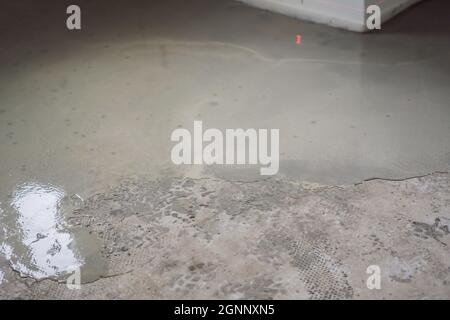 floor partially covering with self-levelling cement mortar Stock Photo